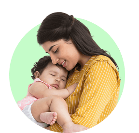 Mother holding a sleeping baby